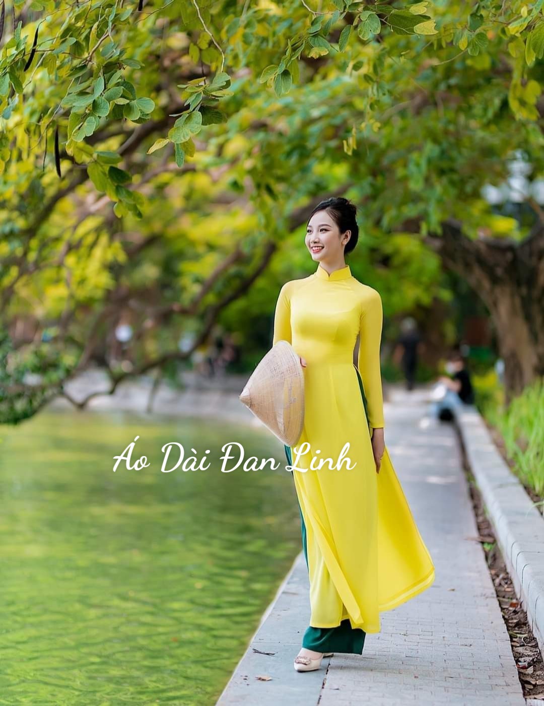 Áo dài trơn 4 tà màu vàng cúc - áo dài đan linh
