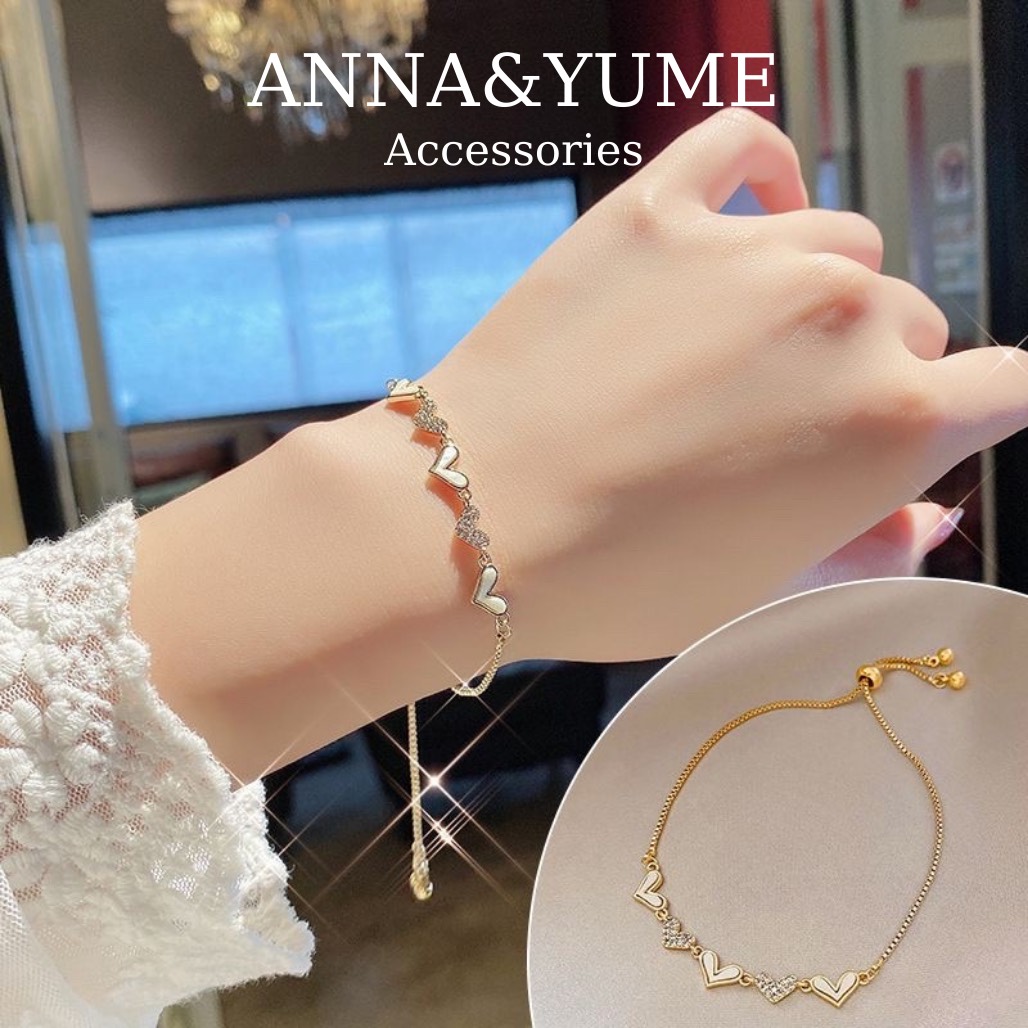 Vòng tay titan nữ dây rút trái tim, lắc tay rút trái tim
