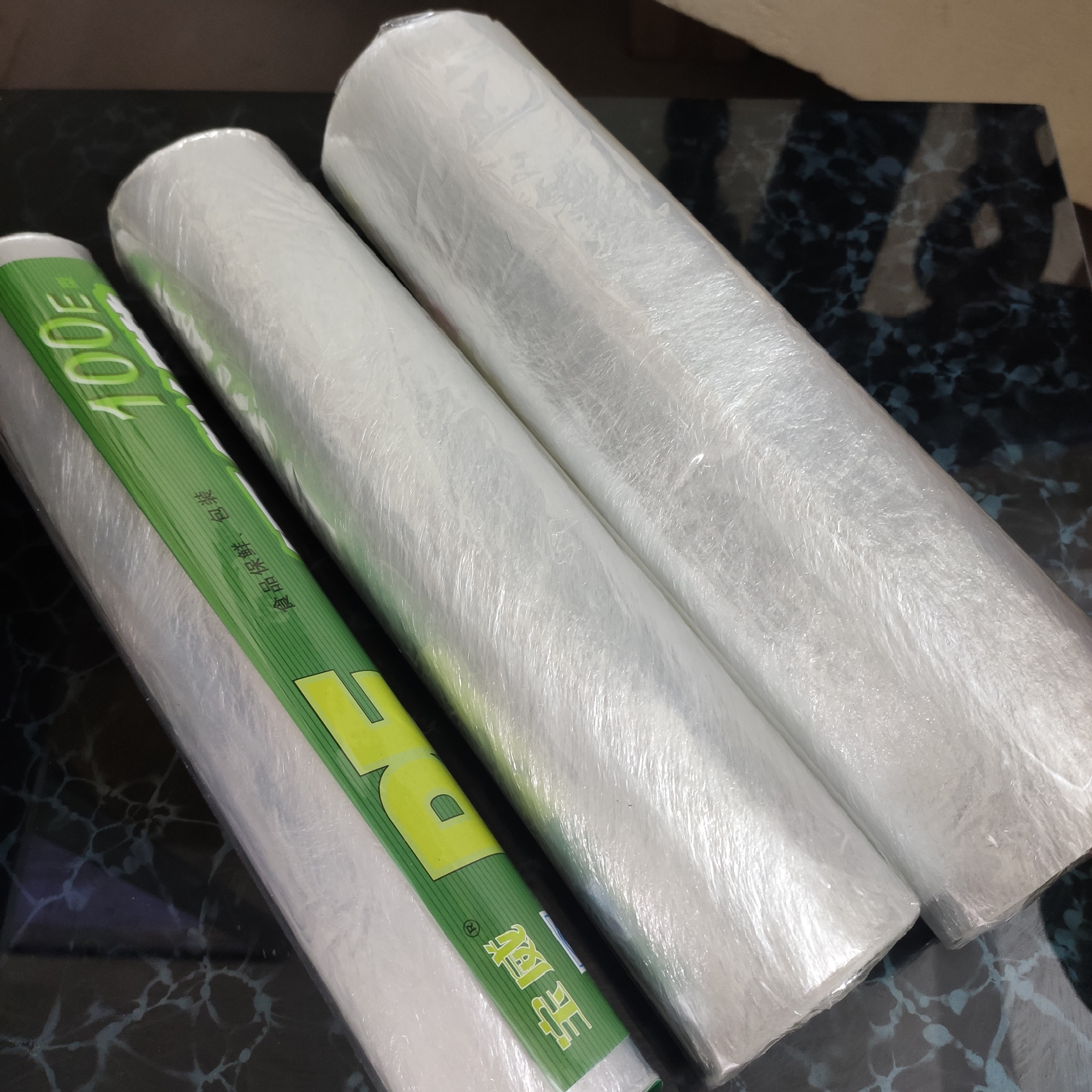 Cuộn nilon 100m bọc ủ tê xăm hình