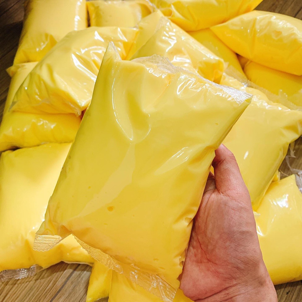 Bơ vàng ăn với bánh tráng hoặc bánh mì
