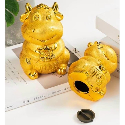Trâu vàng đựng tiền tiết kiệm  may mắn