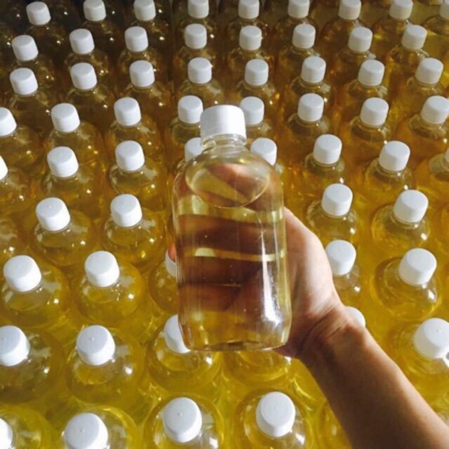 1 lít 2 chai dầu dừa nấu thủ công thơm lừng.