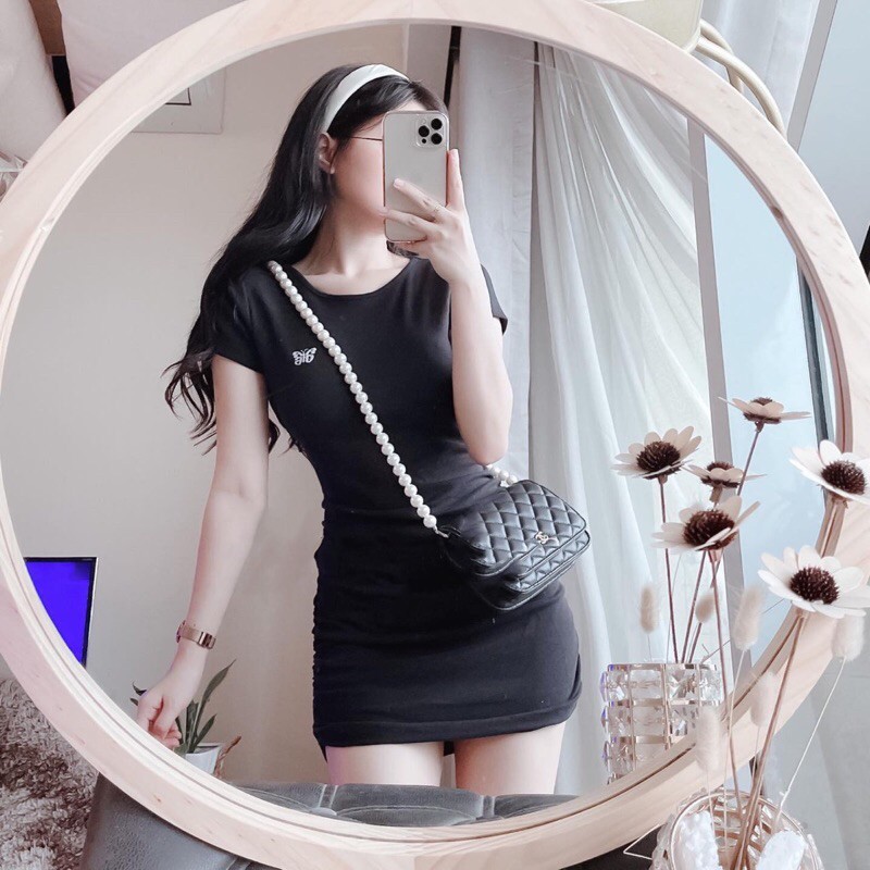 Váy lô gô bướm rút hông TT12