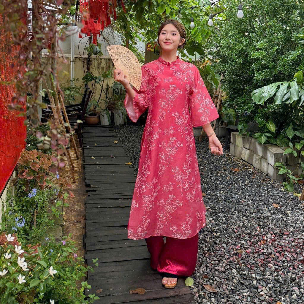 Bộ áo dài trơn màu cam lụa tằm mịn