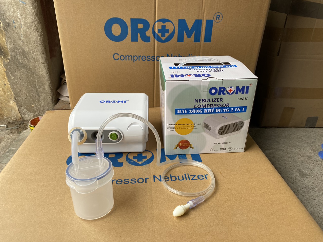 Máy xông khí dung và hút mũi 2 trong 1 oromi c28m
