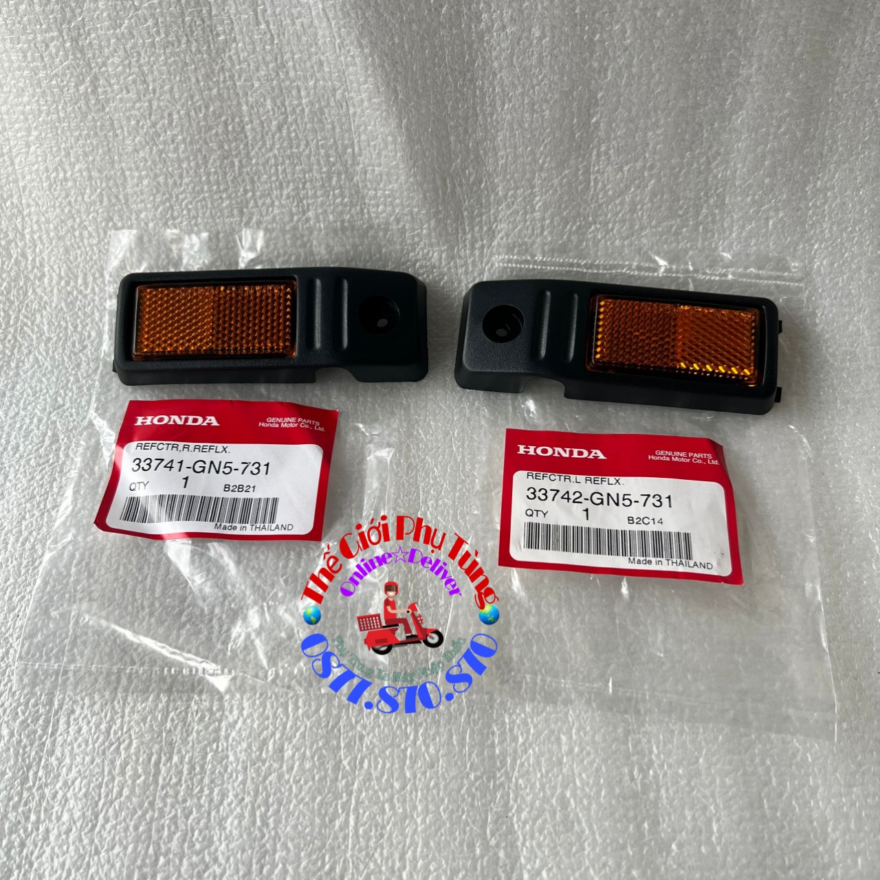 Cặp mắt mèo - phản quang ốp phuộc dream lùn zin honda thái lan 33741-gn5-731 / 33742-gn5-731