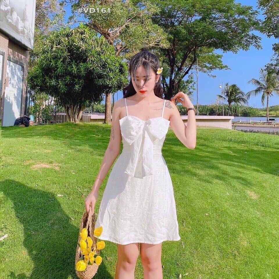 Đầm hai dây đính nơ ngực cúc họa mi cực cool