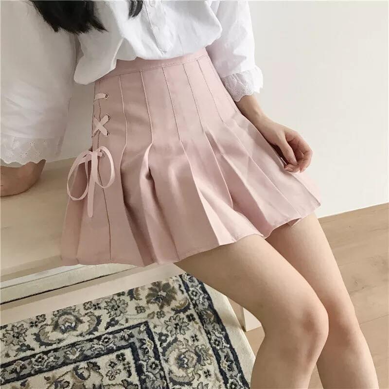 Chân váy xếp ly buộc nơ dễ thương
