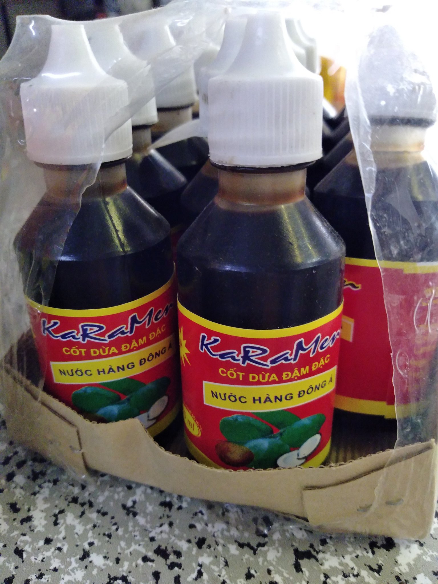 Nước hàng (kẹo đắng) hương dừa kho thịt cá - lọ 100ml