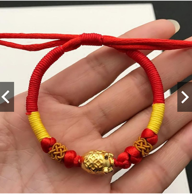 Vòng tay chỉ đỏ con heo may mắn