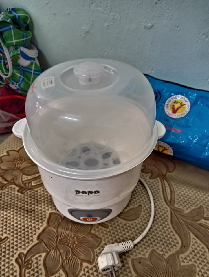 máy tiệt trùng bình sữa