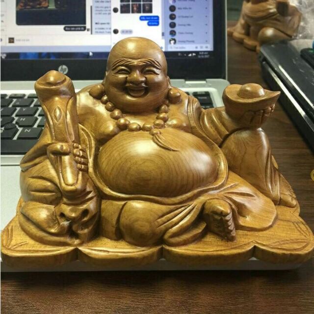 Di lặc để xe hơi bàn làm vi&ecirc;̣c- tặng vòng đeo tay