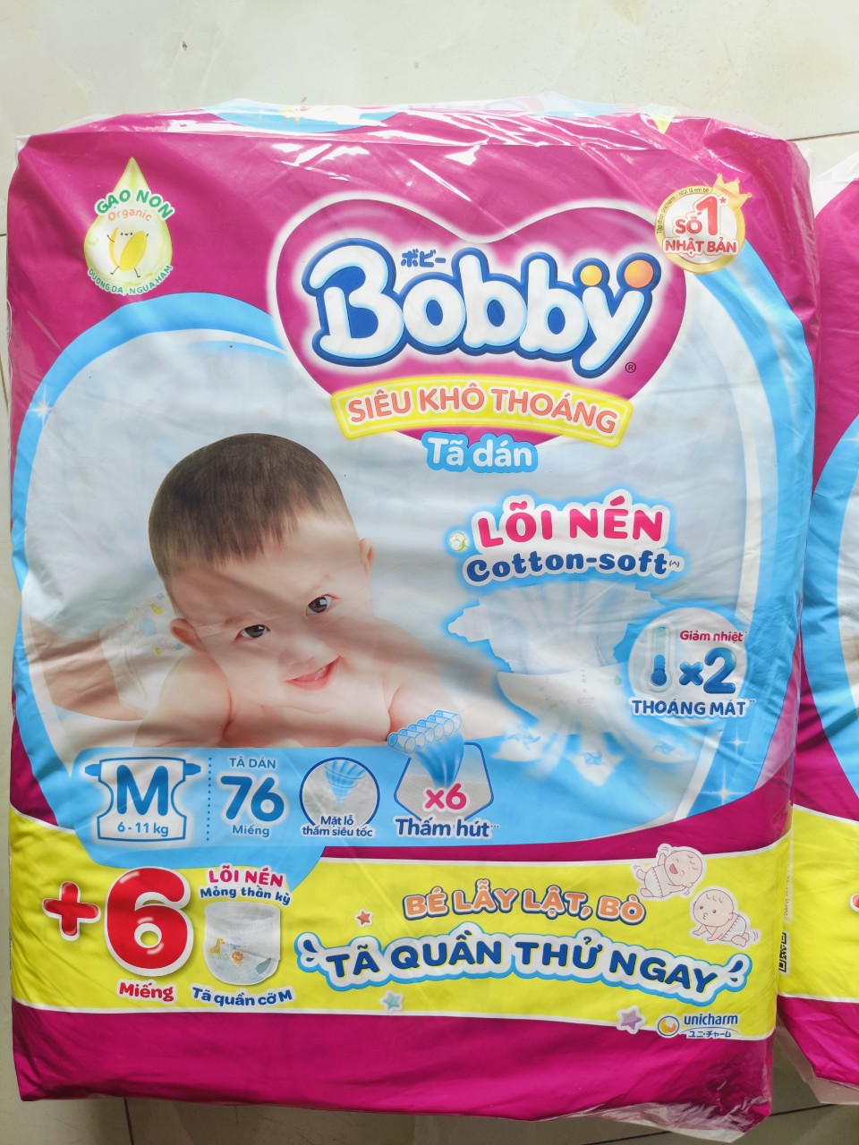 Tã dán Bobby size M76+6 mẫu mới gạo non lõi nén 3mm cho bé từ 6-11kg