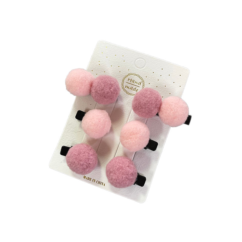 set 2 kẹp tóc pon pon cho bé .