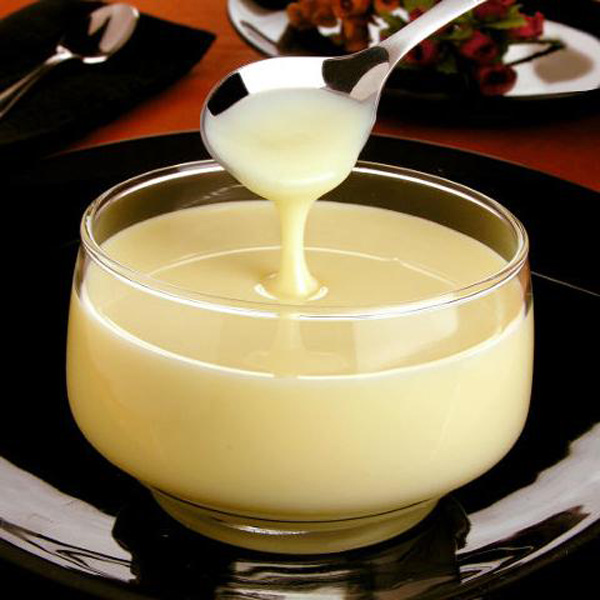 Con bo 2 lon Sữa Đặc Ông Thọ Đỏ Lon 380G