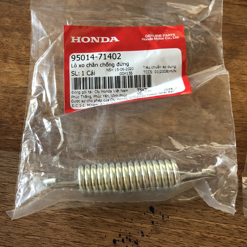 Lò xo chân chống Honda