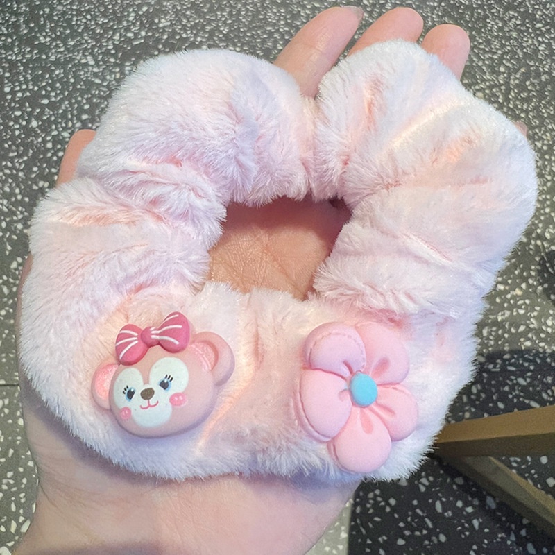 Cột tóc lông gấu hồng cute