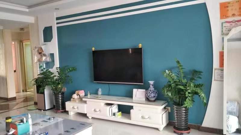 Cuộn 10m giấy dán tường xanh đậm có keo sẵn.