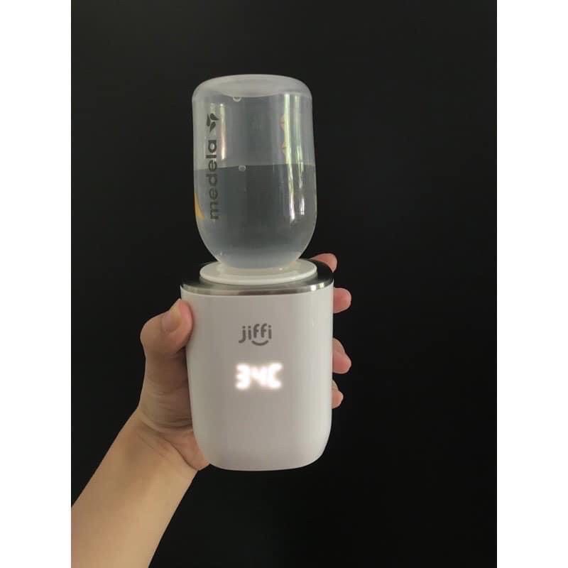 Máy hâm sữa(nước) JIFFI di động bảo hành 6 tháng