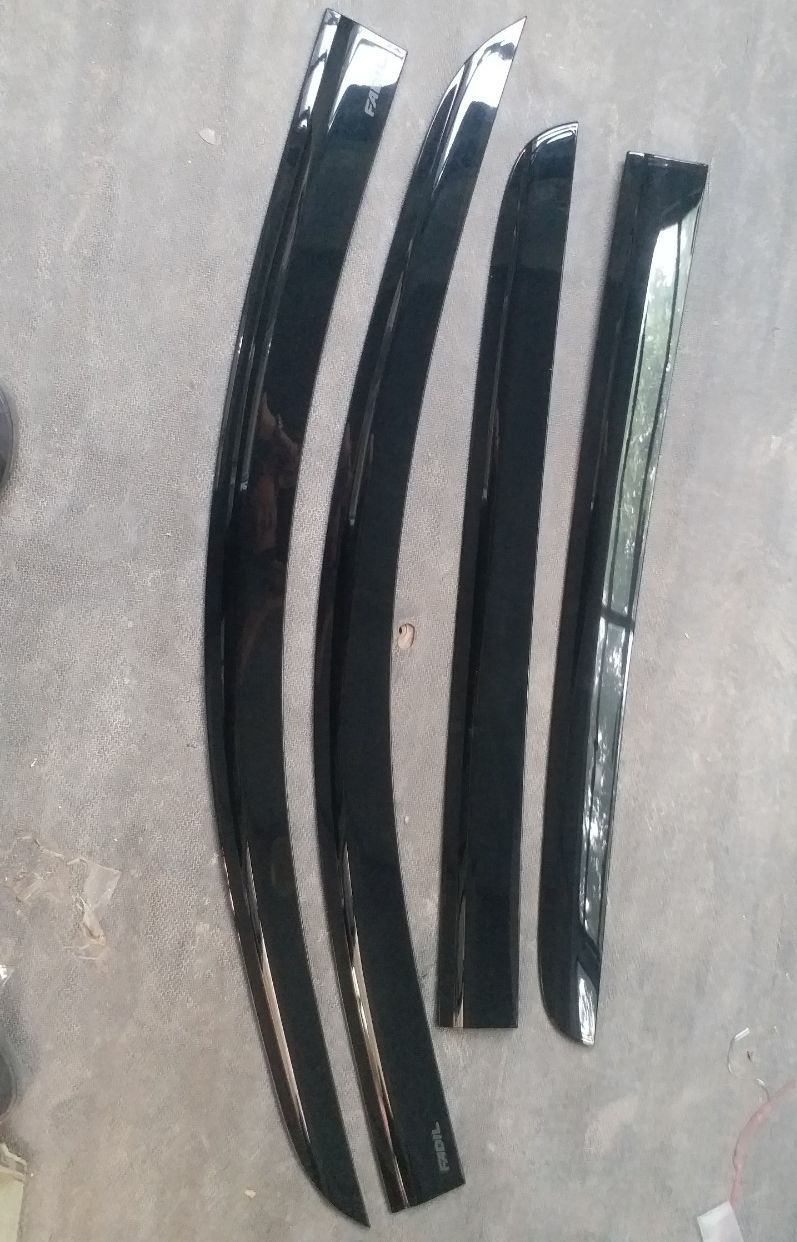 Bộ vè mưa đen xe Fadil