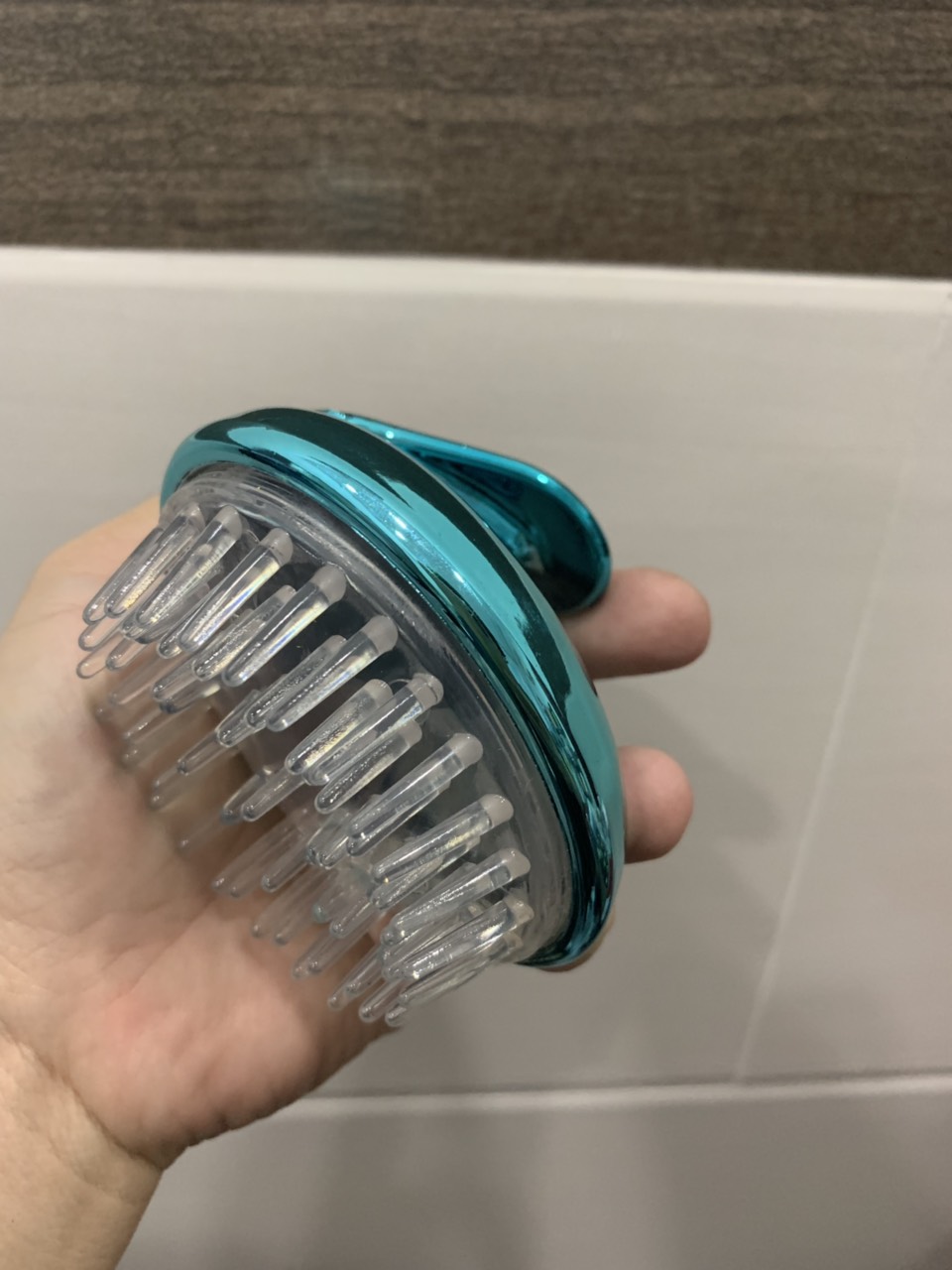 Lược gội đầu silicon màu xanh
