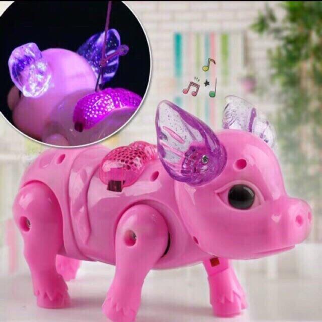 ( FREE SHIP - MUA 1 TẶNG 1 ) Đồ chơi chú HEO ( Lợn) biết đi có dây dắt ( chạy pin )