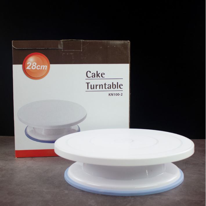 Bàn xoay nhựa màu trắng 28cm làm bánh kem kèm đế chống trượt