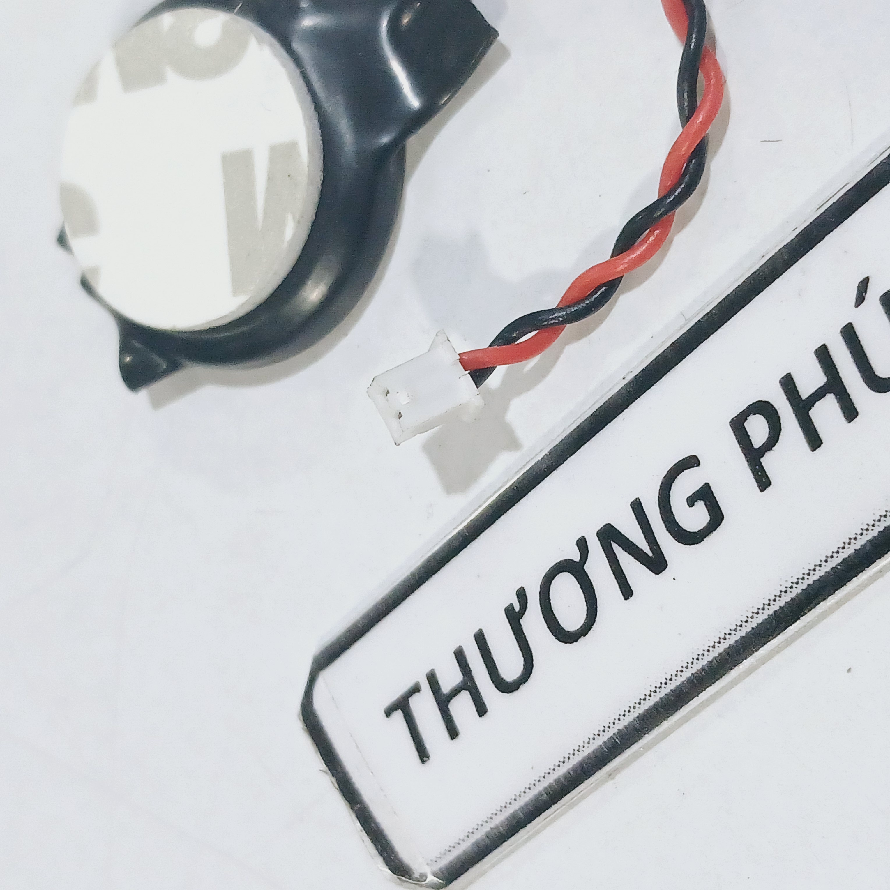 Pin Cmos 2032, CR2032 - 3V (Loại 2 dây 2 lổ / Kích thước đầu cắm (R X D): 2.5mm x 3.5mm)