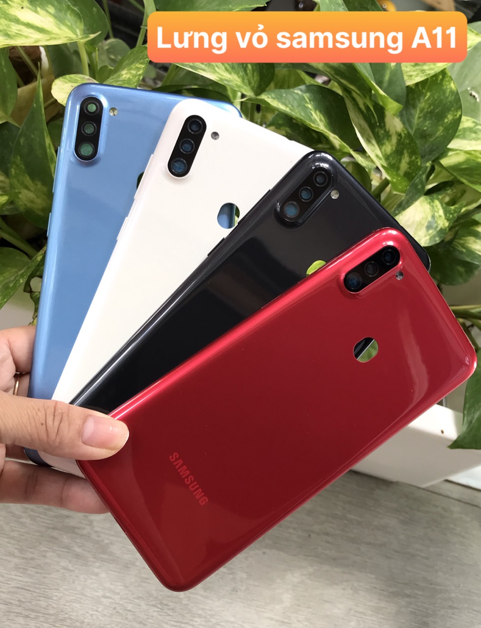 nắp lưng samsung A11 ( gồm lưng, phím bấm kính camera)