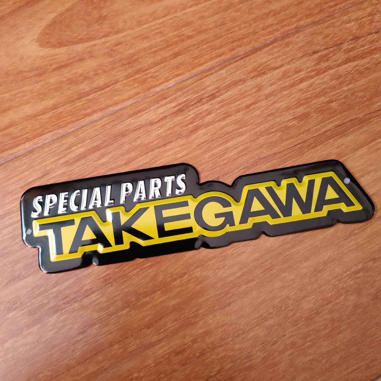 Tem nhôm dán Pô Takegawa 13x3.3cm