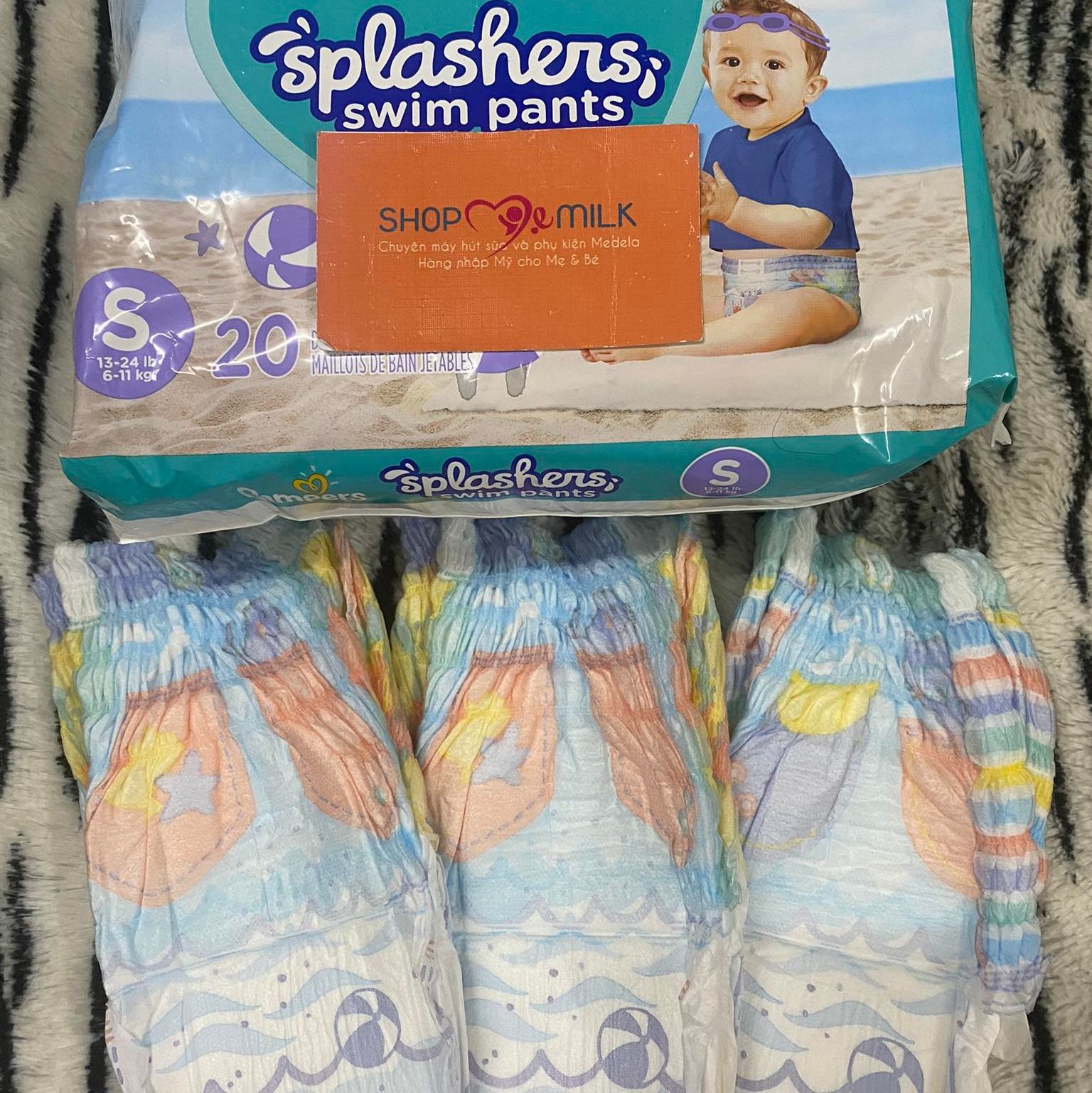 Tã/Bỉm quần bơi, đi biển cho bé USA Pampers Splashers Swim Diapers Size S,M,L