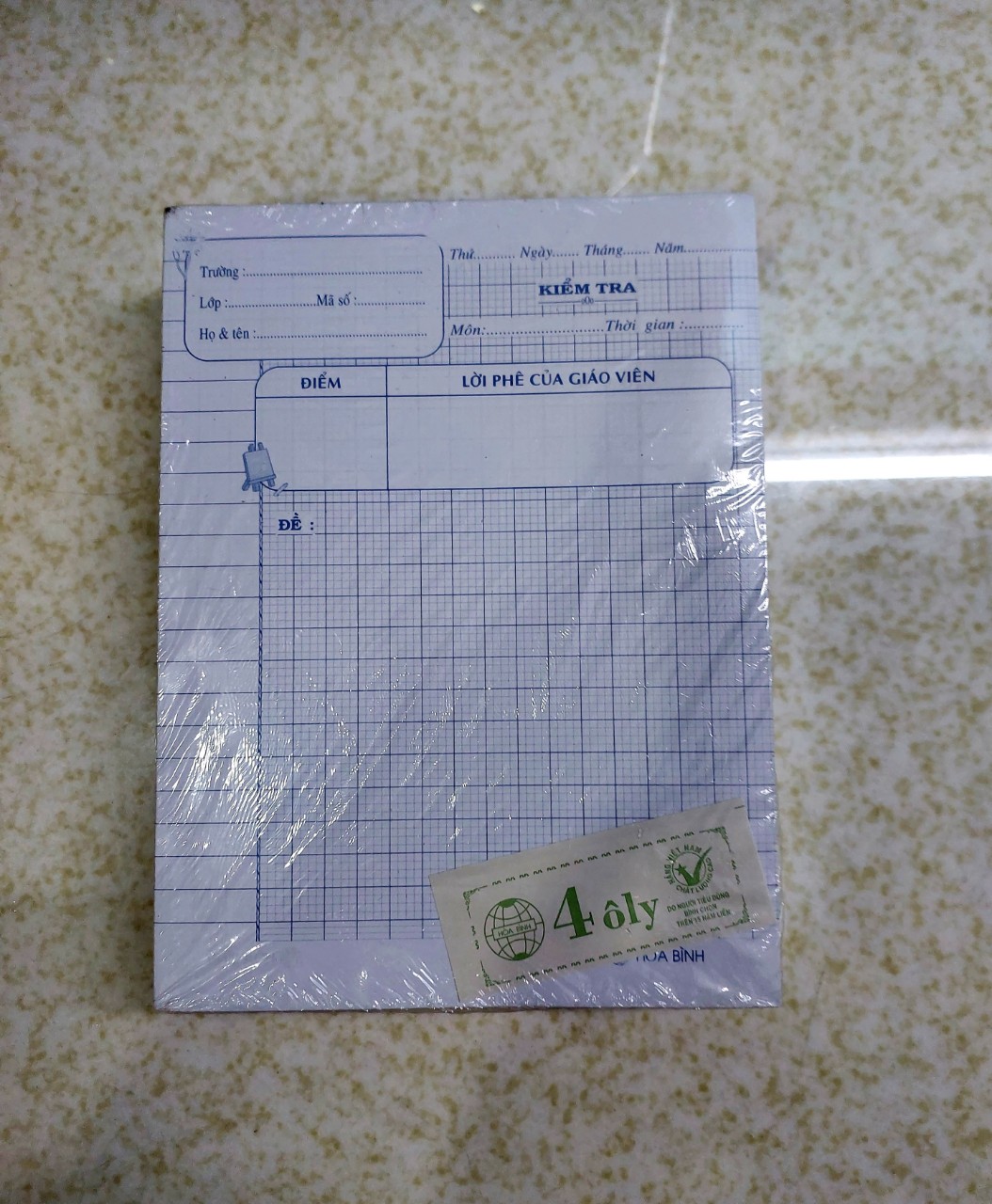 Lốc giấy kiểm tra 4 ô ly