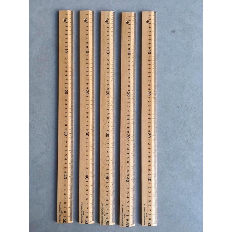Thước gỗ vẻ may AA loại tốt bóng đẹp có thước 50Cm, 60Cm, thước bầu vui lòng chọn trong phân loại. dùng để đo vẻ nghành may, ngoài ra còn dùng làm roi để dạy con
