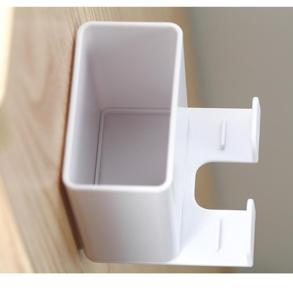 Kệ đựng remote máy lạnh - Hộp đựng điều khiển - Gía lưu trử sạc điện thoại dán tường -Có móc máng chui điện