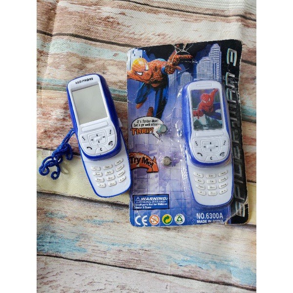 Điện thoại di động đồ chơi nắp trượt Toy Phát Nhạc 3 pin 6-12 tháng tuổi
