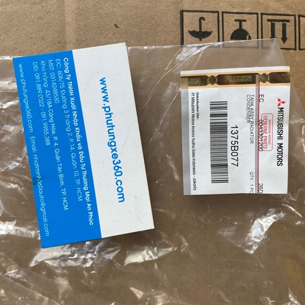 Bình nước phụ Xpander Mitsubishi 1375B077 (Cái)