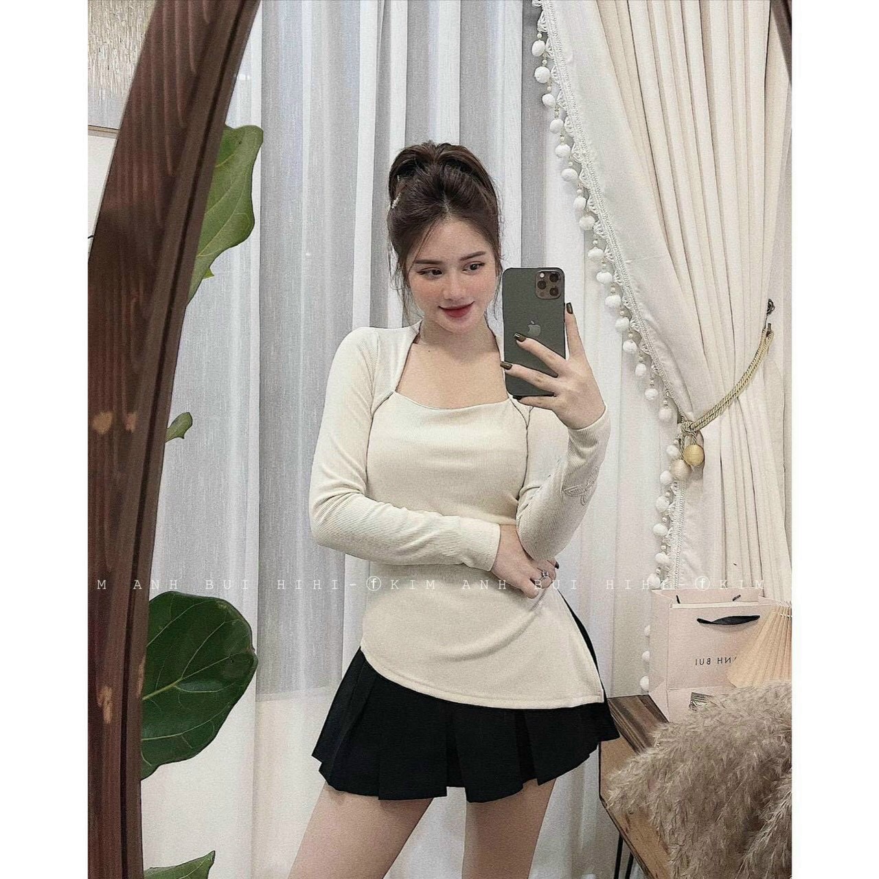 Áo thun nữ tay dài, kiểu xẻ tà, chất thun gân