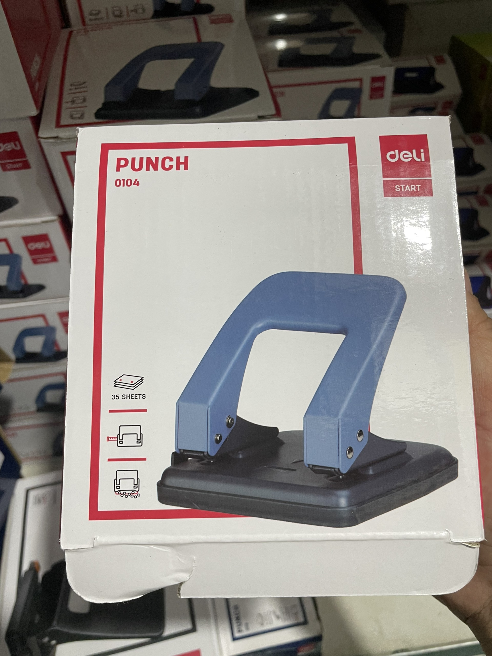 Máy đục lỗ 35 tờ deli - e0104