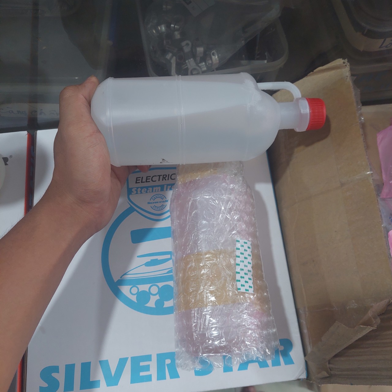 chai dầu 1 lít máy may công nghiệp