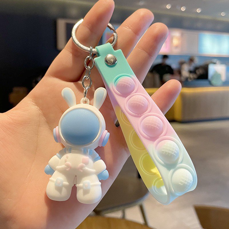 Móc khoá phi hành gia tai thỏ dây pop pit