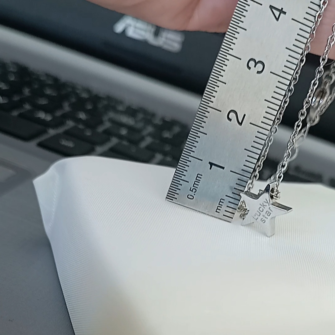 Dây chuyền titan ngôi sao trắng