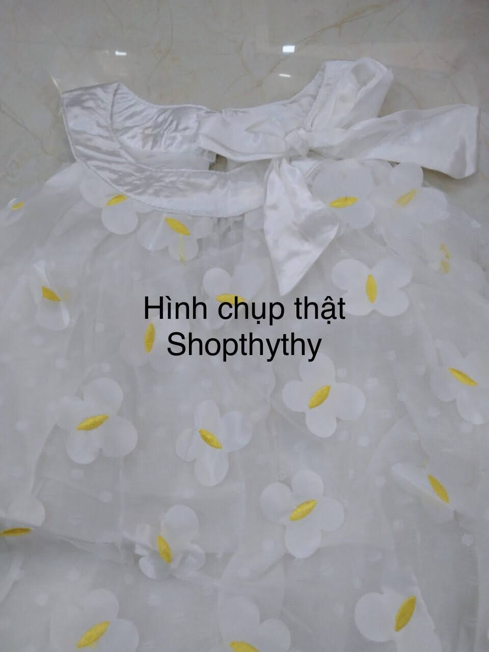 VÁY BÉ GÁI MÀU TRẮNG BƯỚM 3D