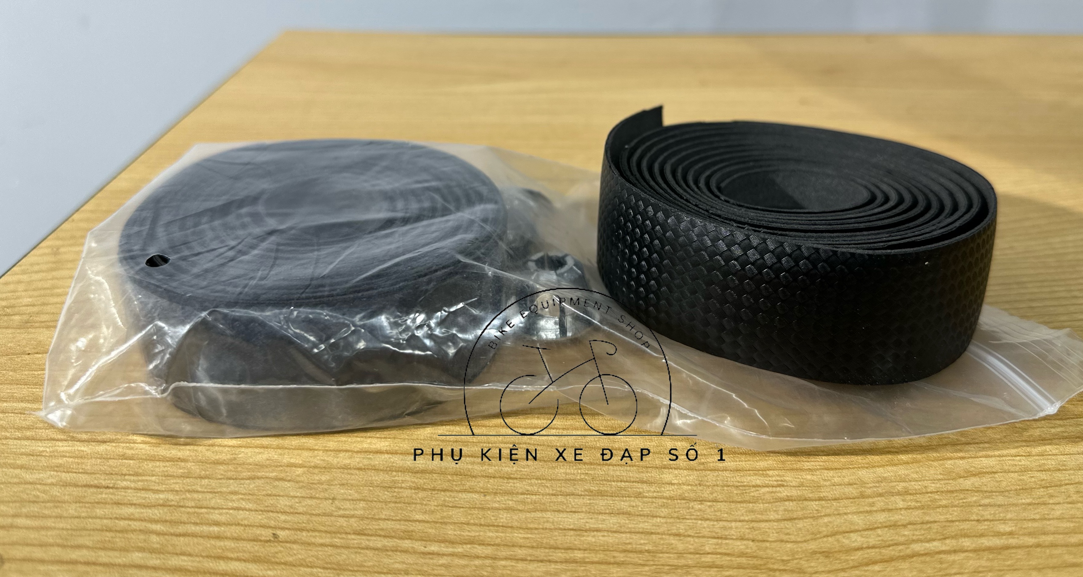 BĂNG QUẤN GHI ĐÔNG XE ĐẠP VÂN CARBON