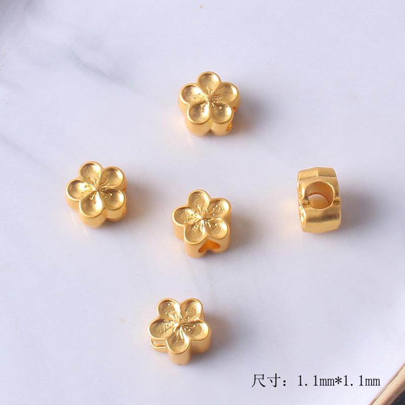 Charm xỏ ngang hoa mai vàng - KL201