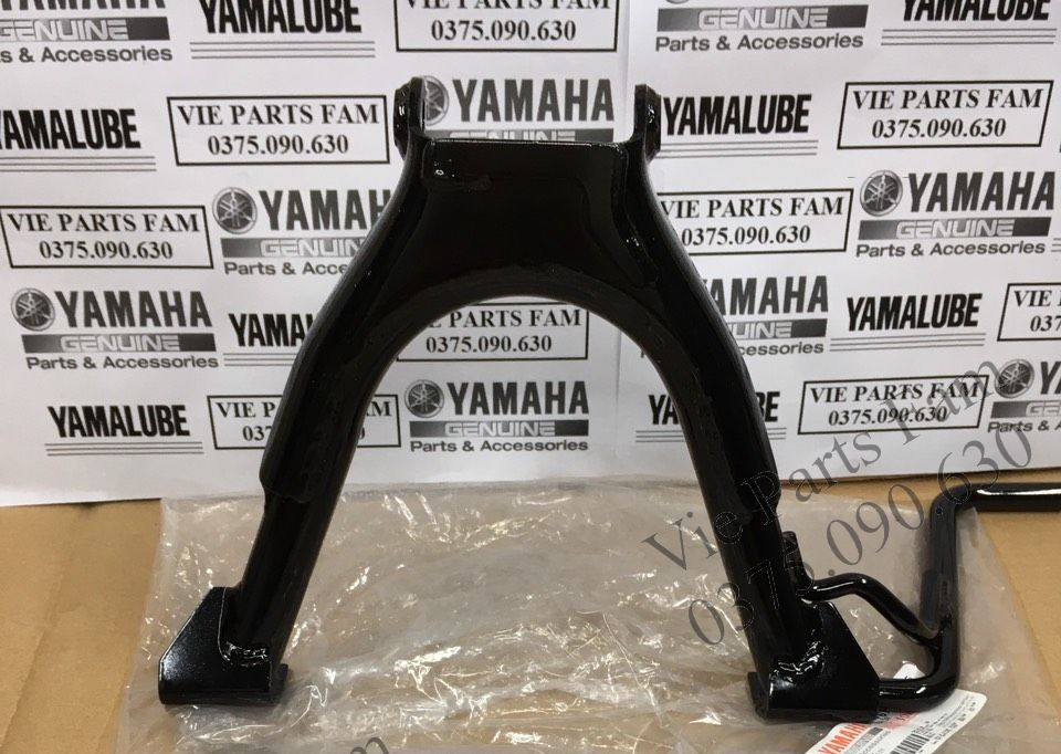 Chống đứng / chống giữa xe mio, hàng din yamaha mới 100%