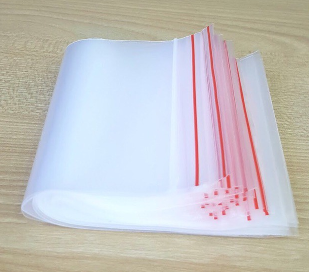 1 kg túi ZIPPER chỉ đỏ 30x40cm