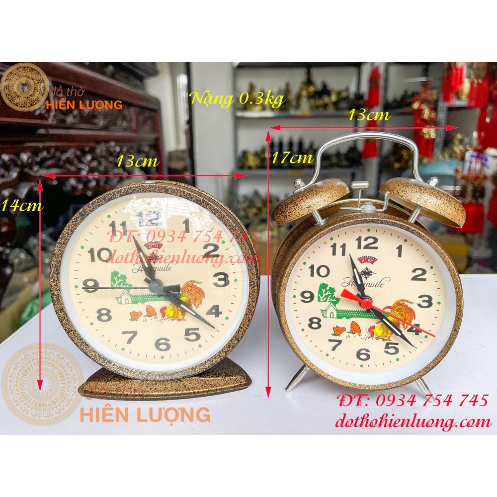 Đồng hồ báo thức in hình con gà mổ thóc, chạy bằng cơ lên dây cót