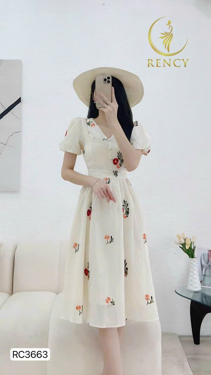 Đầm xòe xốp hoa tay phồng nút bọc cổ tim