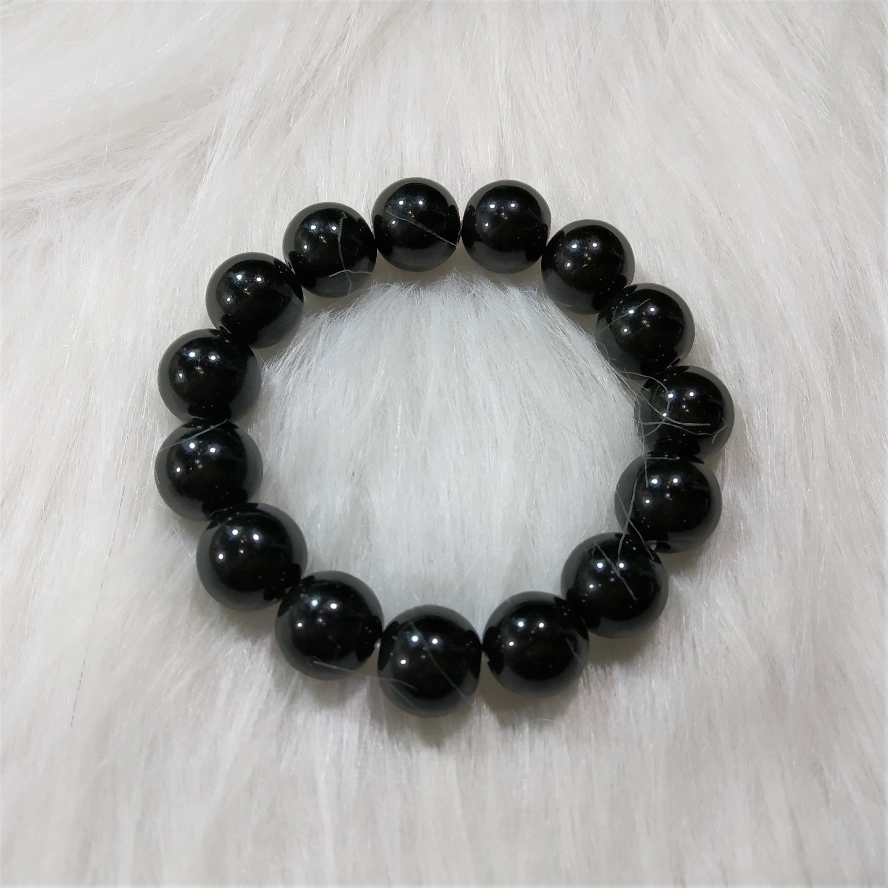 Vòng tay đá obsidian đen 12 ly