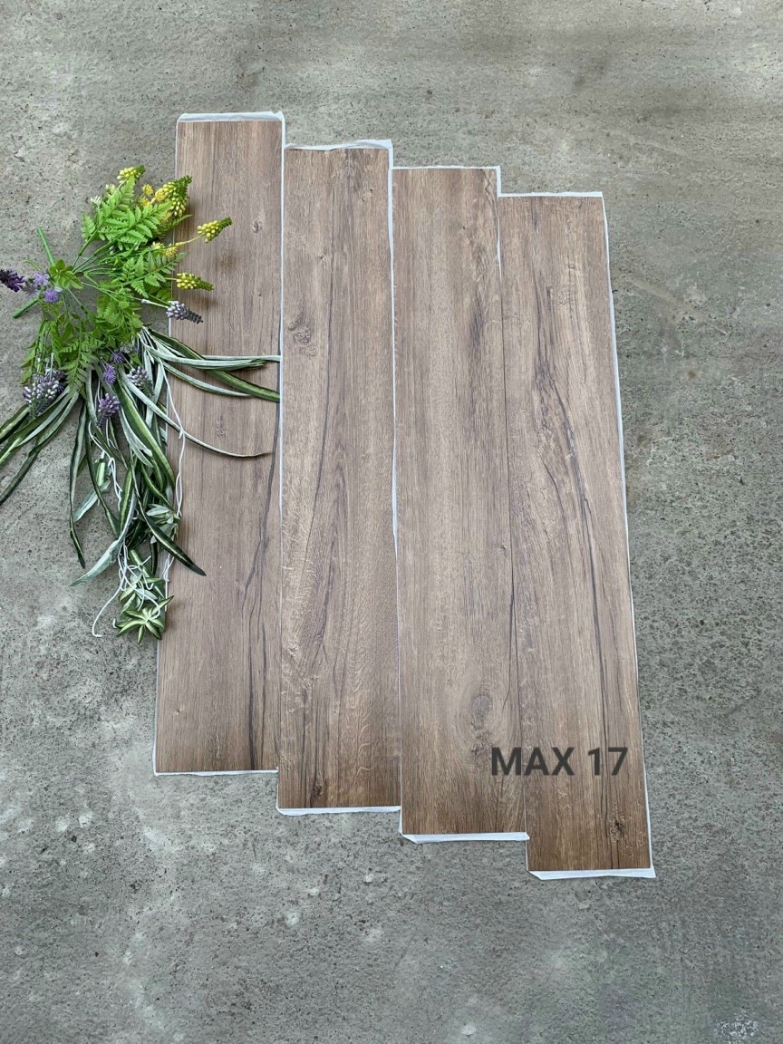 Sàn giả gỗ - Lót sàn giả gỗ - Sàn nhựa giả gỗ dán keo. Miếng dán sàn  giả gỗ tự dán kích thước 91,4cmx15,8cm. (7 tấm 1 mét vuông)